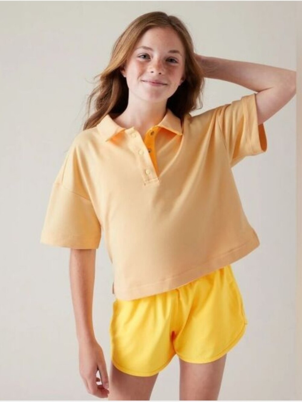 Althleta Polo Snap Button Yellow Shirt Small 6 7